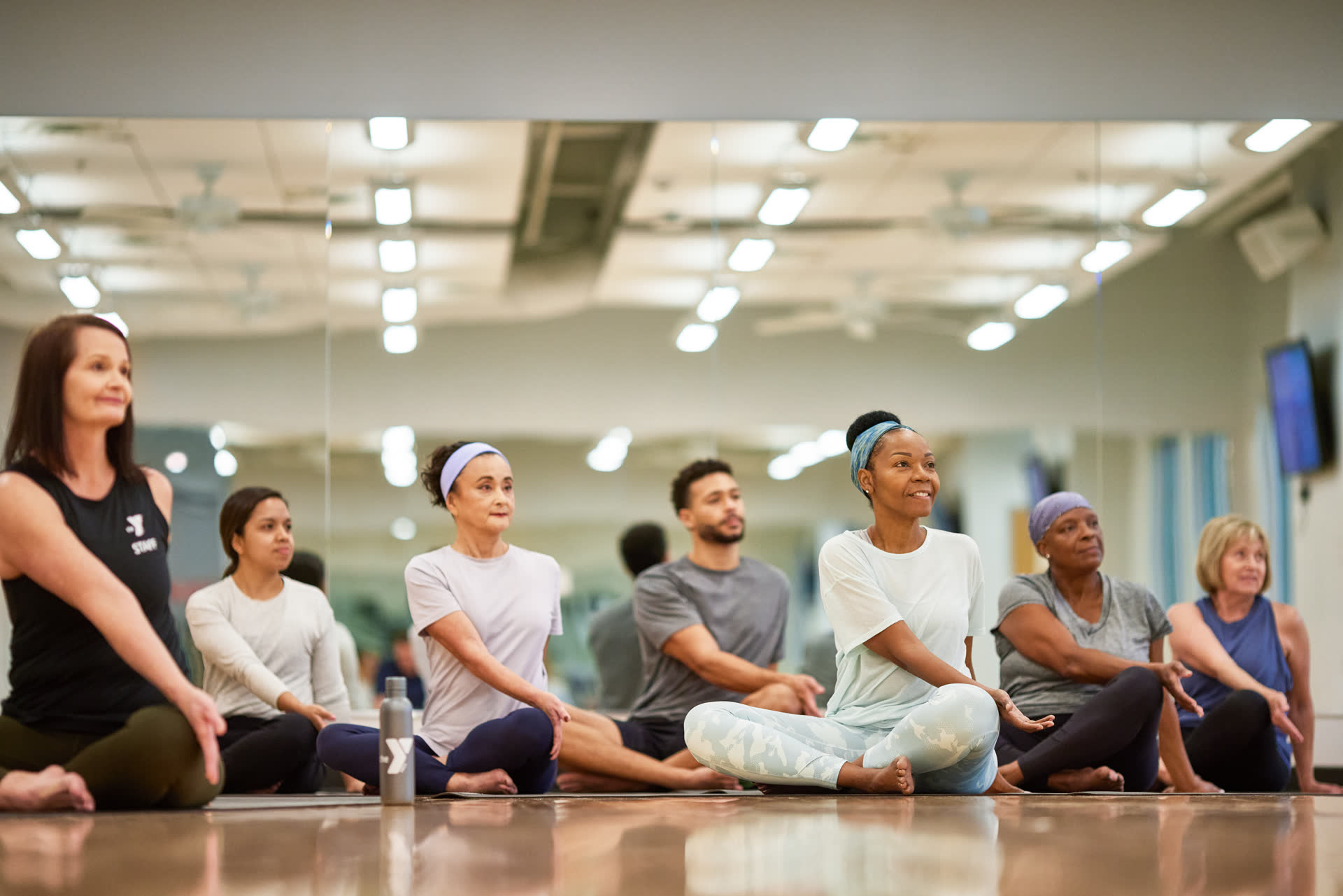 YMCA members stretching for a workout