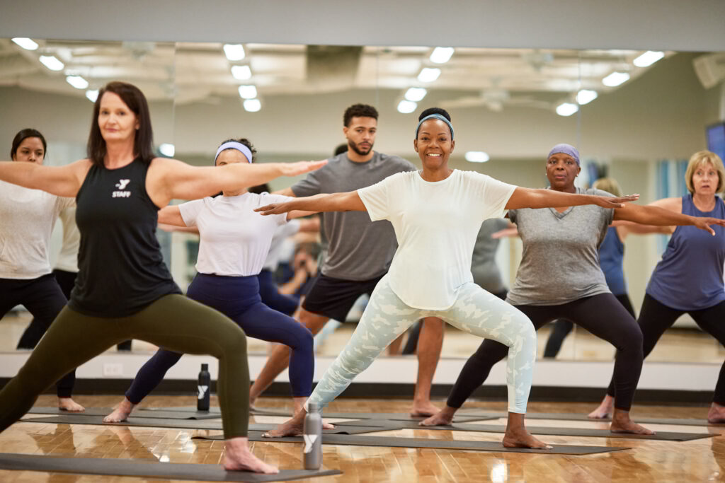 YMCA members exercising in a Health & Wellness class