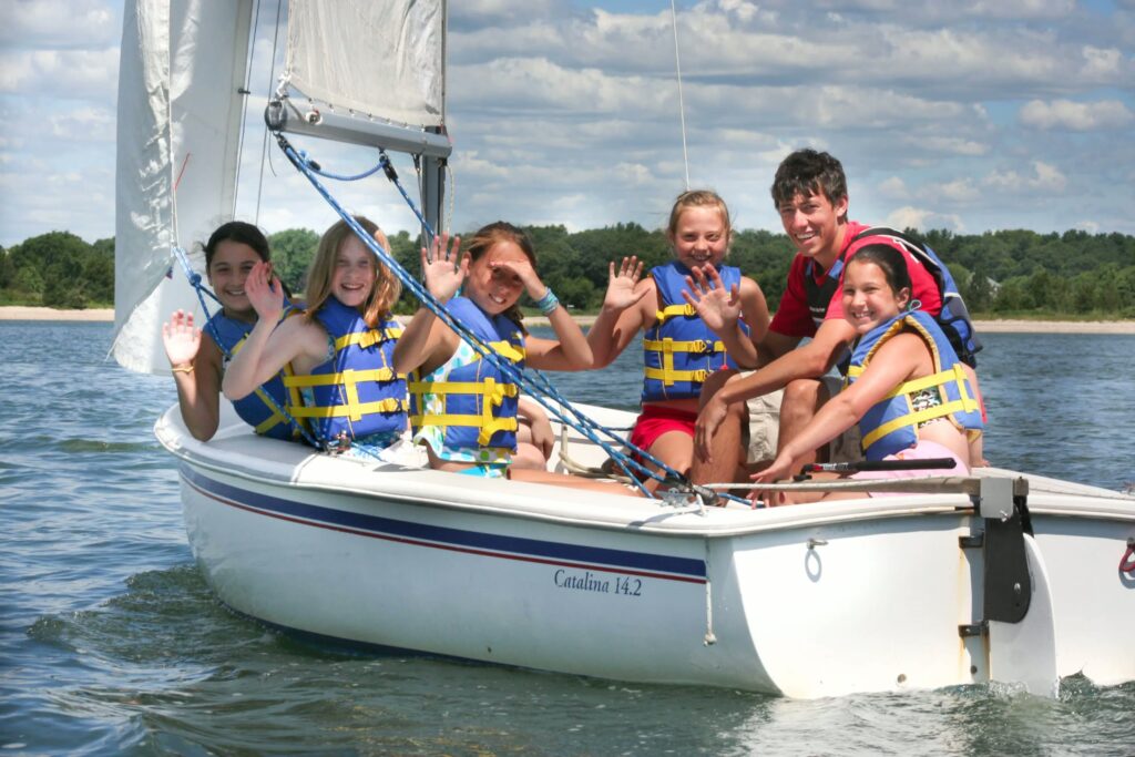 Children enjoying a boat ride at the Mattapoisett YMCA