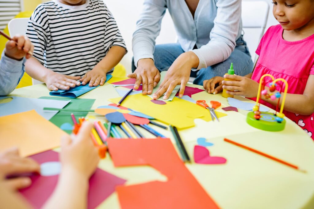 School aged children working on arts and crafts